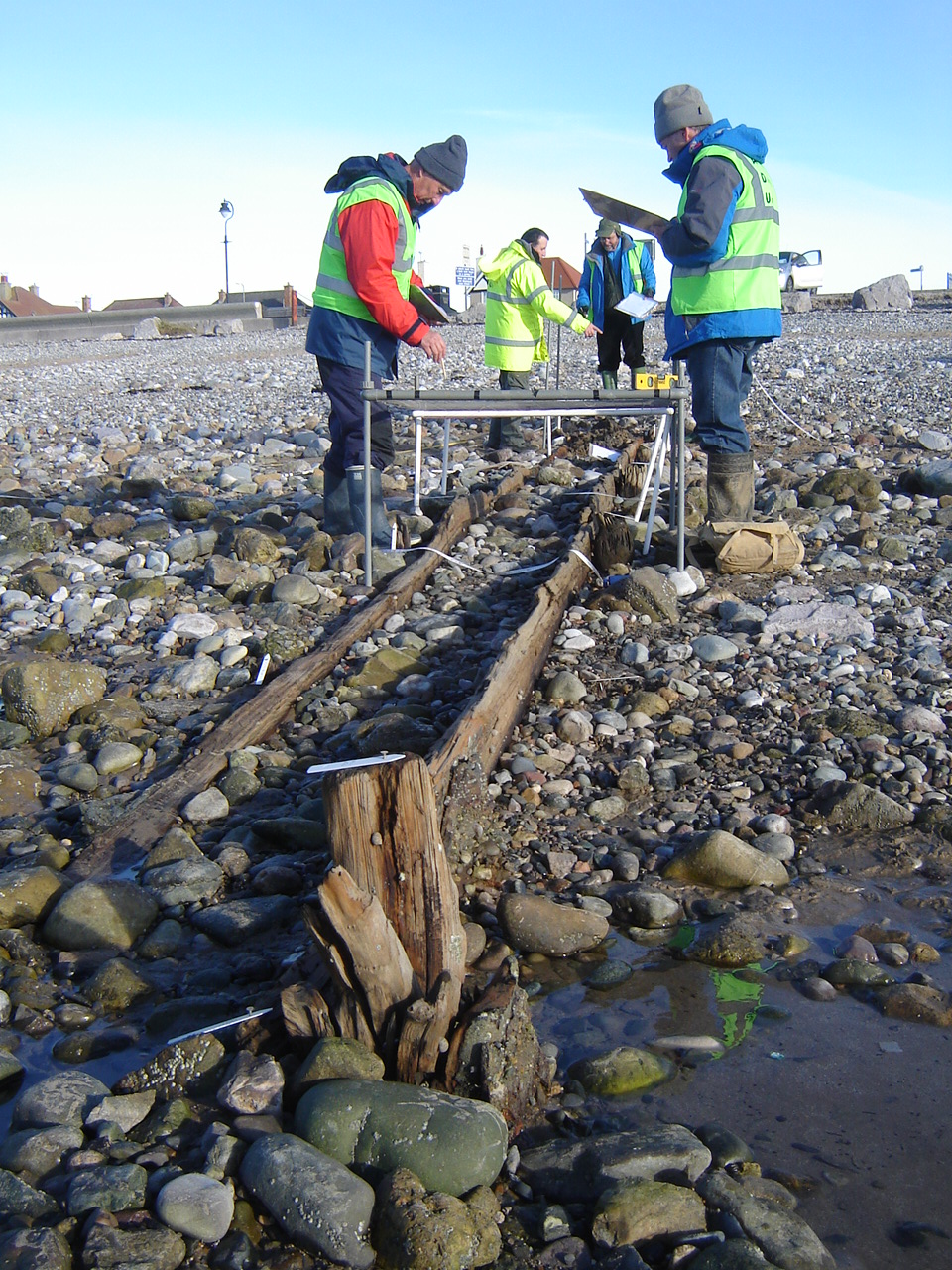 Volunteers from the Ships' Timbers Maritime Museum carying out Planning Frame exercises.